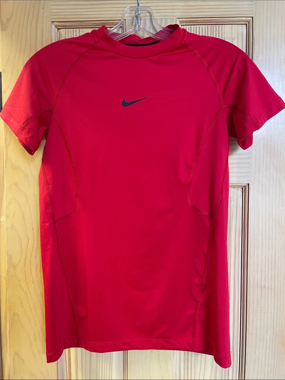 Nike Pro Boys Size Large Red Short Sleeve Performance Shirt with Black Swoosh